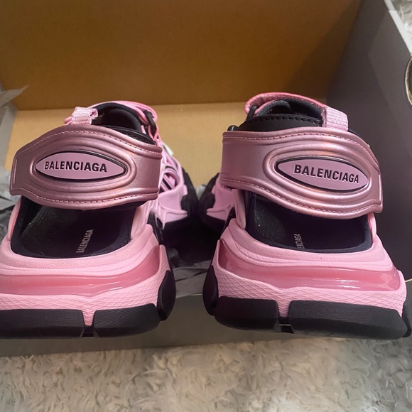 I’m selling never been worn pink and black Balenciaga sandals